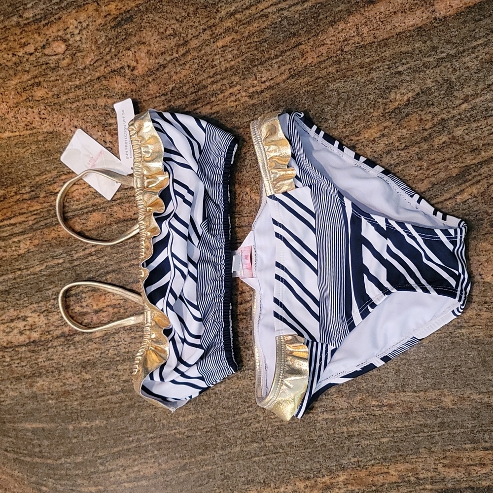 Tommy Bahama girls swim suit. New with Tags
